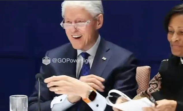 Bill Clinton examines hot tub photo from Epstein files during deposition