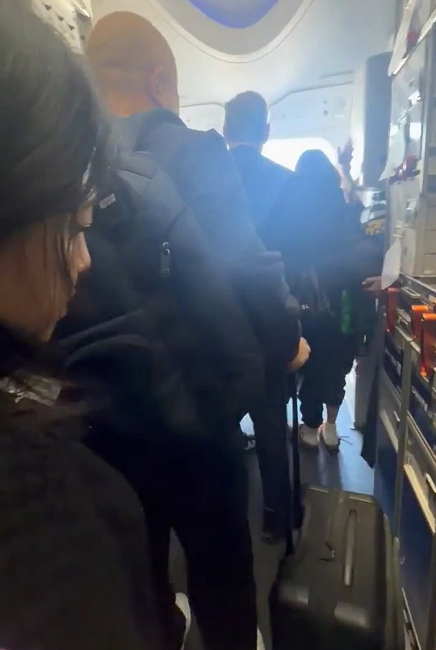 United Airlines Flight Evacuates Amid Cabin Smoke, Passengers Clutch Luggage at LAX