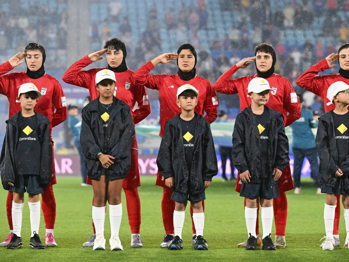 Iranian Women's Football Team's Emotional Anthem Display Sparks Fears for Their Safety Amid Political Pressures