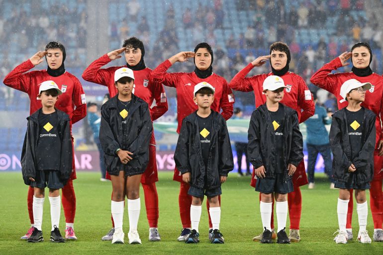 Iranian Women's Football Team's Emotional Anthem Display Sparks Fears for Their Safety Amid Political Pressures