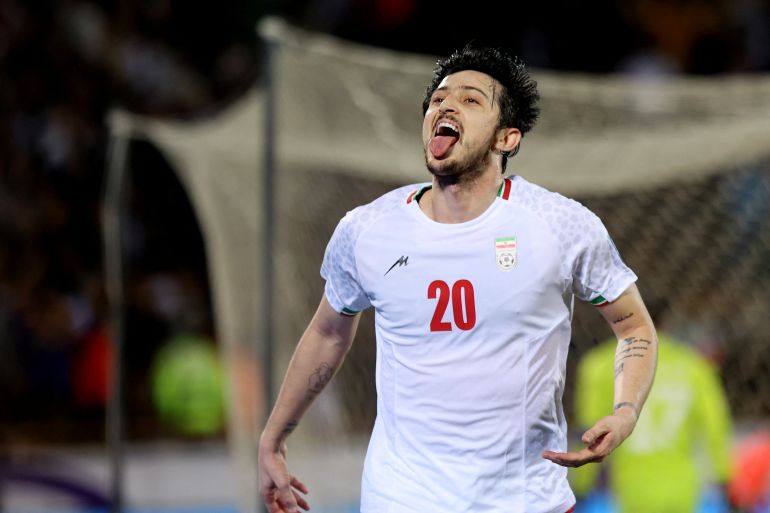Sardar Azmoun Expelled from Iran Team Over Dubai Social Media Post Amid Political Firestorm