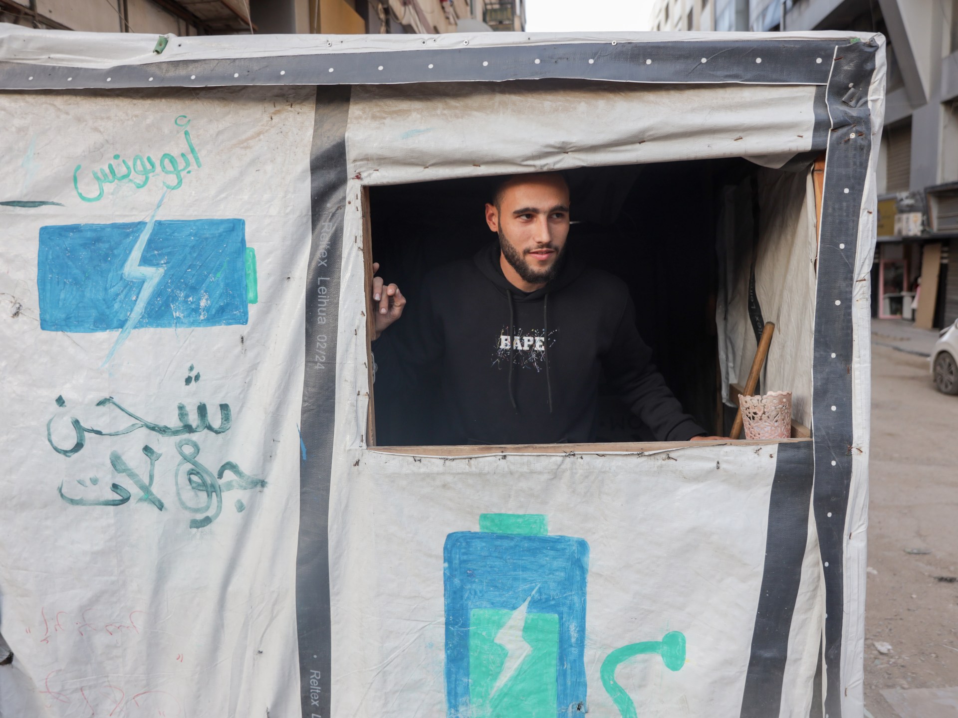 From Gallery to Charging Stations: Gaza's Economic Crisis Alters Artist's Fate