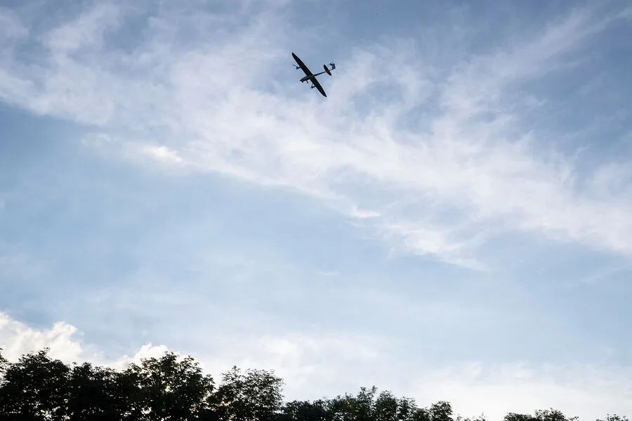 Ukrainian drone strikes hit Zaporizhzhia hospital and market, injuring two residents.