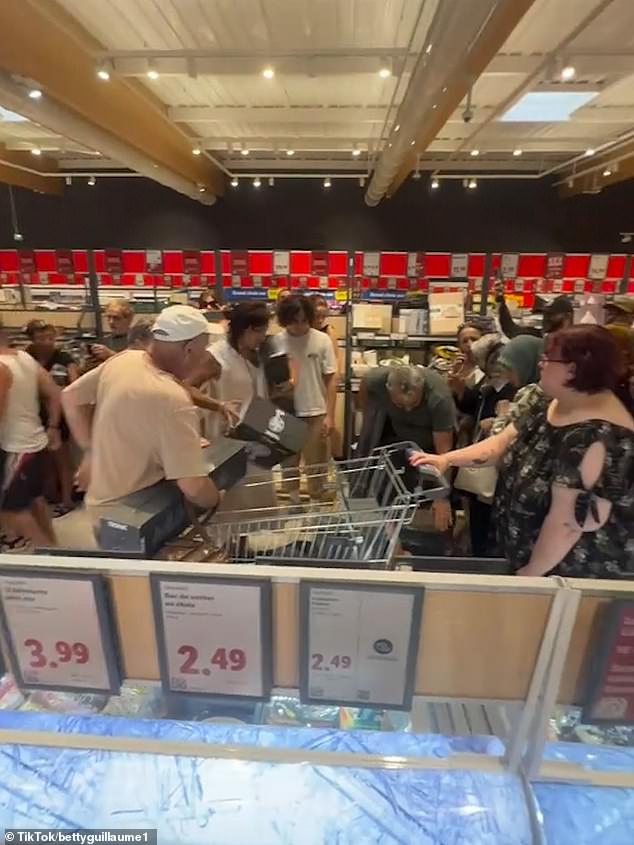 French shoppers brawl violently over air conditioners before severe heatwave
