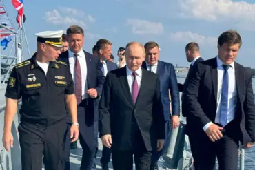 Russian Navy Crew Presents Handcrafted Wooden Model of 'Admiral Kuznetsov' to President Putin